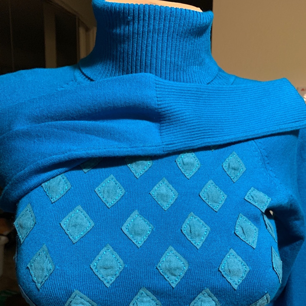 Turquoise turtleneck sweater